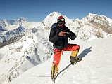 01 Climbing Sherpa Lal Singh Tamang Taking Pictures Of Me On The Chulu Far East Summit At 6056m At 9am With Annapurna I, Chulu East and Central Behind 
